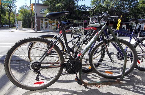 BORIS MINKEVICH / WINNIPEG FREE PRESS Illustrative photos of bikes locked up in Winnipeg. Photos taken on Sherbrook Street between Wolseley Ave. and Westminister Ave. Followup to the Bicycle Theft  Awareness/Prevention: Lock it, or lose it press conference. August 22, 2016