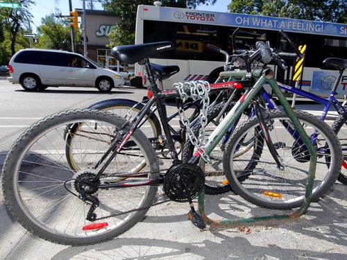 BORIS MINKEVICH / WINNIPEG FREE PRESS Illustrative photos of bikes locked up in Winnipeg. Photos taken on Sherbrook Street between Wolseley Ave. and Westminister Ave. Followup to the Bicycle Theft  Awareness/Prevention: Lock it, or lose it press conference. August 22, 2016