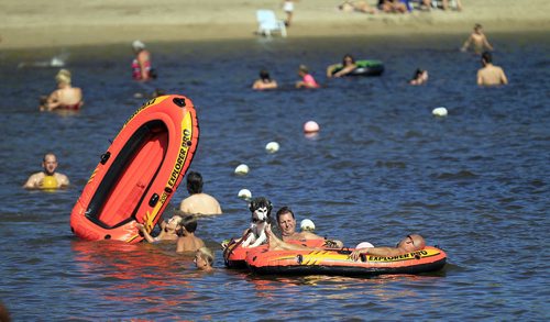 PHIL HOSSACK / WINNIPEG FREE PRESS -   Beachgoers enjoy the water at St Malo Provincial Park Monday afternoon. See story. August 22, 2016