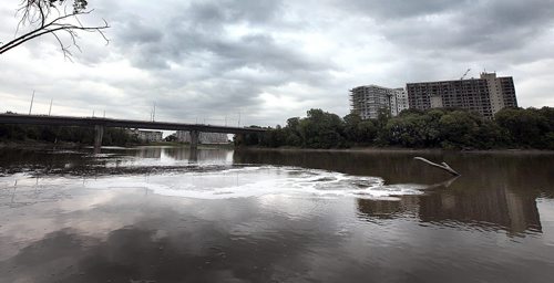 PHIL HOSSACK / WINNIPEG FREE PRESS -   Treated (and sometimes untreated) sewage bubbles up from underneath the surface of the red river just south of the cheif pequis bridge Tuesday. The outlet is where the Main street sewage tyreatment plant expells its efluent. See story. August 23, 2016