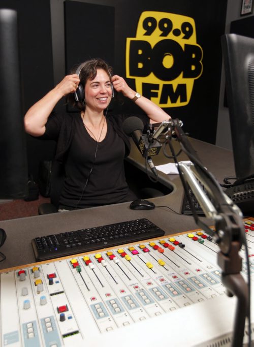 BORIS MINKEVICH / WINNIPEG FREE PRESS IINTERSECTION -  Desiree Daniels, who is celebrating her 25th anniversary on the airwaves this year, poses for some photos in the BOB FM studio at 1445 Pembina Highway. Dez has been a Winnipeg radio fixture since the '90s, when she started at CITI-FM, before moving on to Q-FM, where she became the "Dez" of Beau, Tom and Dez. She was doing a live show at 99.9 BOB FM. DAVE SANDERSON STORY. August 23, 2016