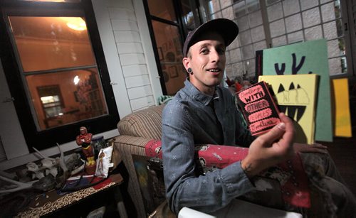 PHIL HOSSACK / WINNIPEG FREE PRESS -  Dany Reede, a Winnipeg zine maker holds some of the "Zines" he produces showcasing his work. See story. August 24, 2016