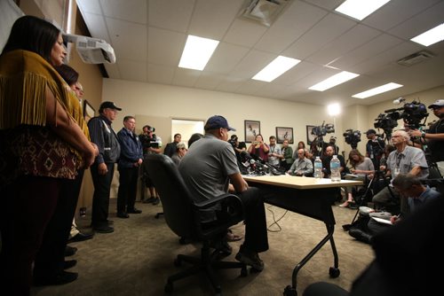 RUTH BONNEVILLE / WINNIPEG FREE PRESS  Norway House comfort residents Leon Swanson (grey shirt and blue hat) and resident David Tait sit at table with former Aboriginal Affairs Minister Eric Robinson as he announces to the media that Leon Swanson and  David Tait are victims of the second case of switched children at birth at Norway House Offices in Winnipeg Friday.    Aug 26, 2016