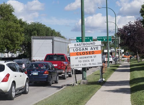 ZACHARY PRONG / WINNIPEG FREE PRESS  Eastbound lanes on Logan Ave. were closed for construction and caused some delays during rush hour traffic. 3:36 p.m. on August 25, 2016.