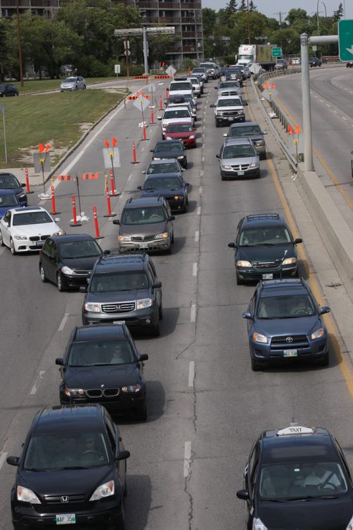 JOE BRYKSA / WINNIPEG FREE PRESS   South bound cars stuck in traffic Friday afternoon on Route 90 just before Portage Ave due to construction-Aug 26, 2016 -(  See Randy Turners story )