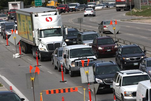 JOE BRYKSA / WINNIPEG FREE PRESS   South bound cars stuck in traffic Friday afternoon on Route 90 just before Portage Ave due to construction-Aug 26, 2016 -(  See Randy Turners story )