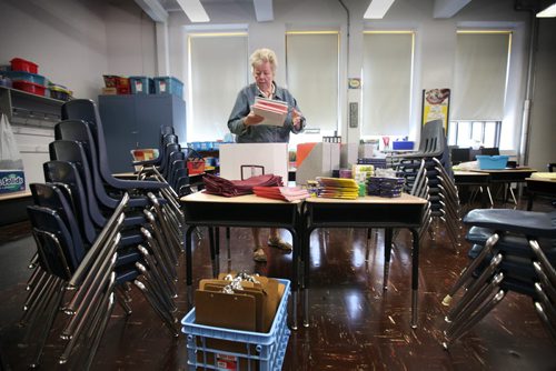 RUTH BONNEVILLE / WINNIPEG FREE PRESS  Local - Isacc Brock photo page for 49.8 Feature / Borders Page for back to school.  Grade four teacher Susan Bryant, sorts out school supplies she purchased on behalf of her students in her classroom as she prepares for another year of students before the 2016/2017 school year begins.    August 25, 2016