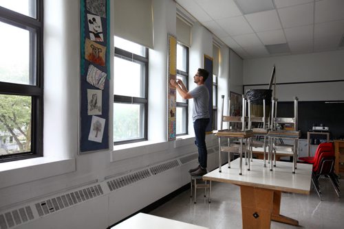 RUTH BONNEVILLE / WINNIPEG FREE PRESS  Local - Isacc Brock photo page for 49.8 Feature / Borders Page for back to school.  Art, technology and Social Studies teacher Jonathan Dueck prepares for his students before the 2016/2017 school year begins.  This is Dueck's first year at Isacc Brock School.    August 25, 2016