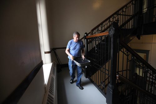 RUTH BONNEVILLE / WINNIPEG FREE PRESS  Local - Isacc Brock photo page for 49.8 Feature / Borders Page for back to school.  Custodian Ian Barry gives the stairs a fresh coat of paint prepping the schooll for students.    August 25, 2016