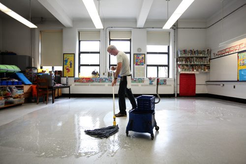 RUTH BONNEVILLE / WINNIPEG FREE PRESS  Local - Isacc Brock photo page for 49.8 Feature / Borders Page for back to school.  School custodian Tom Brown washes the floor in one of the classrooms as he preps the school for new students in fall.     August 25, 2016