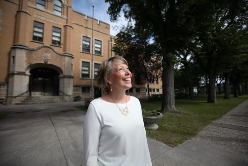 RUTH BONNEVILLE / WINNIPEG FREE PRESS  Local - Isacc Brock photo page for 49.8 Feature / Borders Page for back to school.  School principle Melody Woloschuk is all smiles outside the school looking forward to welcoming 2016/2017 students to school.  The school has 2 new classes, a Ojibway and Cree Kindergarden classes starting in Sept.     August 25, 2016