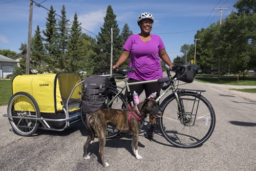 ZACHARY PRONG / WINNIPEG FREE PRESS  Jasmine Reese, an LA native who is currently completing a bike trip around the world with her dog Fiji, stopped by Winnipeg to receive fiddling lessons from Patti Kusturok, a renowned fiddler and instructor from Winnipeg.  August 26, 2016.