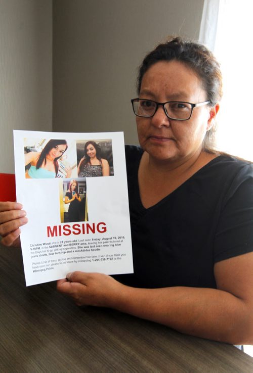 BORIS MINKEVICH / WINNIPEG FREE PRESS Melinda Wood poses for a photo at the Comfort Inn Airport @ 1770 Sargent Ave .  She holds the poster made up for her 21-yr-old daughter Christine Wood, who has been missing since Aug. 19th. Alexandra De Pape story. August 26, 2016