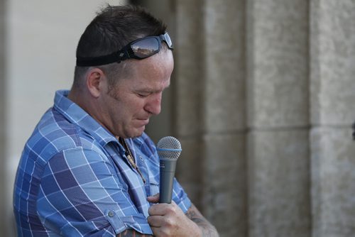 JOHN WOODS / WINNIPEG FREE PRESS Roland Vandal weeps as he speaks at a mental illness rally at the Manitoba Legislature Sunday, August 28, 2016.