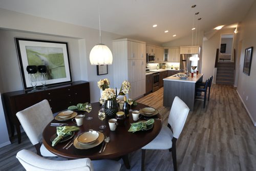 WAYNE GLOWACKI / WINNIPEG FREE PRESS   Homes. The dining area in the great room at 15 Larry Vickar Drive in Devonshire Village (Transcona). The Hilton Homes Spencer Curtis, Todd Lewys story August 29 2016