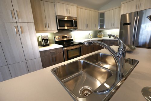 WAYNE GLOWACKI / WINNIPEG FREE PRESS   Homes. The kitchen at 15 Larry Vickar Drive in Devonshire Village (Transcona). The Hilton Homes Spencer Curtis, Todd Lewys story August 29 2016