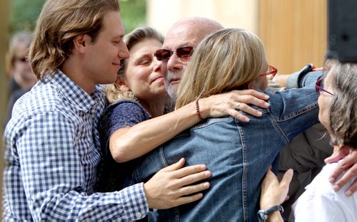 JASON HALSTEAD / WINNIPEG FREE PRESS  Henteleff Park Foundation president emeritus Yude Henteleff is embraced by family members as the Henteleff Park Foundation held the grand opening of its interpretive centre at Henteleff Park at 1964 St. Mary's Rd. on Aug 27, 2016.   (See Social Page)