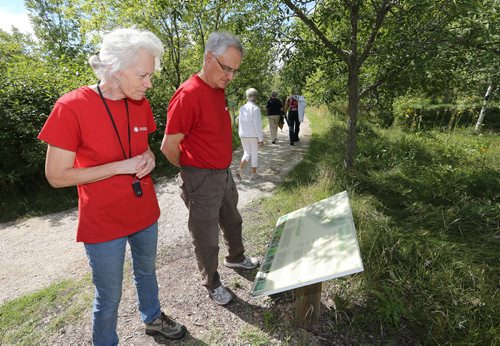 JASON HALSTEAD / WINNIPEG FREE PRESS  Attendees check park signage as the Henteleff Park Foundation held the grand opening of its interpretive centre at Henteleff Park at 1964 St. Mary's Rd. on Aug 27, 2016.   (See Social Page)