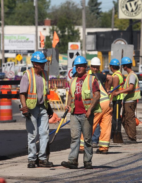 JOE BRYKSA / WINNIPEG FREE PRESSRoad crews lay new asphalt on St Marys road in Winnipeg Tuesday- Aug 30, 2016 -(See Santin Story)