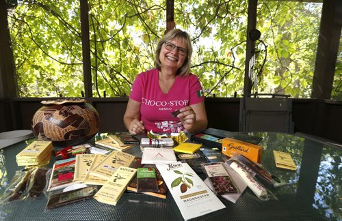WAYNE GLOWACKI / WINNIPEG FREE PRESS  Food feature piece on chocolate tasting. Doreen Pendgracs with an assortment of handcrafted artisan made excellent chocolate from around the world. She is at her home in Matlock,Mb.  Alison Gillmor story. August 30 2016
