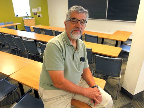 BORIS MINKEVICH / WINNIPEG FREE PRESS ENT - Neil Funk-Unrah, PhD, the associate dean of Menno Simons College/associate professor of conflict resolution, poses for a photo in one of the classrooms at Menno Simons College (102-520 Portage Ave). For feature about negotiation by Allan Small. August 31, 2016