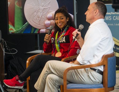 MIKE DEAL / WINNIPEG FREE PRESS Two-time Olympian Champion Desiree Scott appeared at the Winnipeg Free Press News Cafe to sign autographs and talk about her recent experiences during the Rio Olympics with Editor Paul Samyn Wednesday morning. 20160831 - Wednesday August 31, 2016