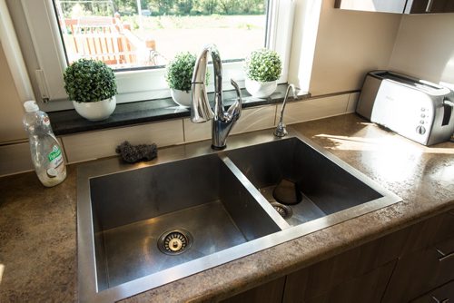 MIKE DEAL / WINNIPEG FREE PRESS Re-Sale Home 22160 Municipal 53N Road in Lorette, MB Kitchen sink 20160830 - Tuesday August 30, 2016