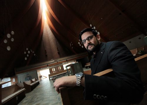 PHIL HOSSACK / WINNIPEG FREE PRESS -  Dr. Nazir Khan re: Muslims and Roman Catholics come together for dialogue around nature of God and human suffering,  he's posing in the sanctuary of Christ the King Roman Catholic Church. Brenda Suderman story.  August 2, 2016