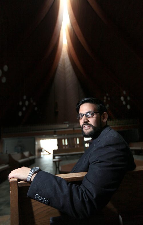 PHIL HOSSACK / WINNIPEG FREE PRESS -  Dr. Nazir Khan re: Muslims and Roman Catholics come together for dialogue around nature of God and human suffering,  he's posing in the sanctuary of Christ the King Roman Catholic Church. Brenda Suderman story.  August 2, 2016
