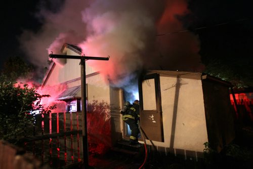 JOE BRYKSA / WINNIPEG FREE PRESSFire crews attack a house fire in the 1000 block of Redwood near 10 PM- Aug 31, 2016 -(See Breaking News)
