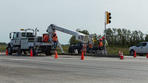 MIKE DEAL / WINNIPEG FREE PRESS Crews work to clean up the intersection of the north Perimeter Hwy and Pipeline Road where a two people were killed in a four-vehicle collision Wednesday afternoon. 20160901 - Thursday September 1, 2016
