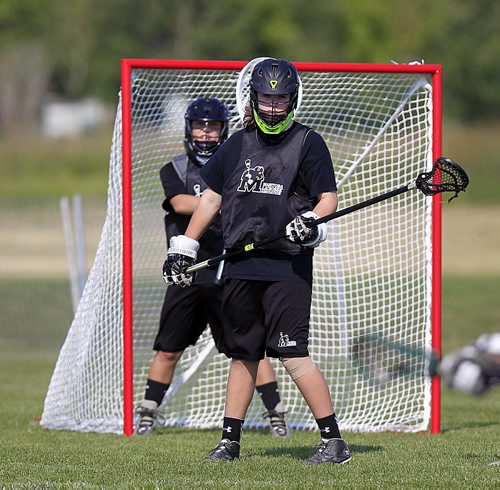 PHIL HOSSACK / WINNIPEG FREE PRESS - 15 and Under lacrosse, Cam Stucky  takes care of business in front of his netminder during the team workout Thursday. See Jason Bell story. September 1, 2016