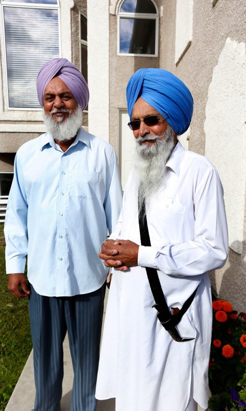 WAYNE GLOWACKI / WINNIPEG FREE PRESS
 

 At right, Harpal Gill, 68, was refused entry into the Dollarama on Jefferson Ave. Thursday because he was wearing his ceremonial Sikh  kirpan. He was with his neighbour Joginder Sidhu when he was refused entry at the store. Carol Sanders story Sept. 9 2016