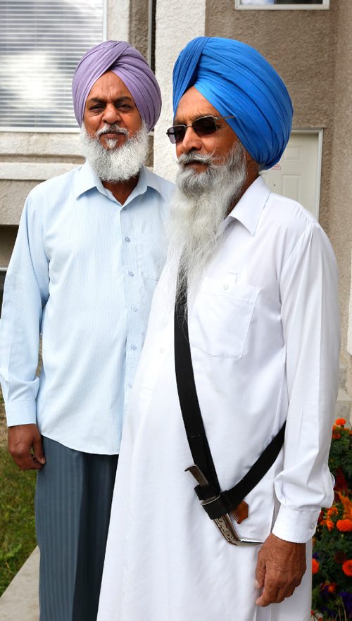 WAYNE GLOWACKI / WINNIPEG FREE PRESS
 

 At right,  Harpal Gill, 68, was refused entry into the Dollarama on Jefferson Ave. Thursday because he was wearing his ceremonial Sikh  kirpan. He was with his neighbour Joginder Sidhu when he was refused entry at the store. Carol Sanders story Sept. 9 2016