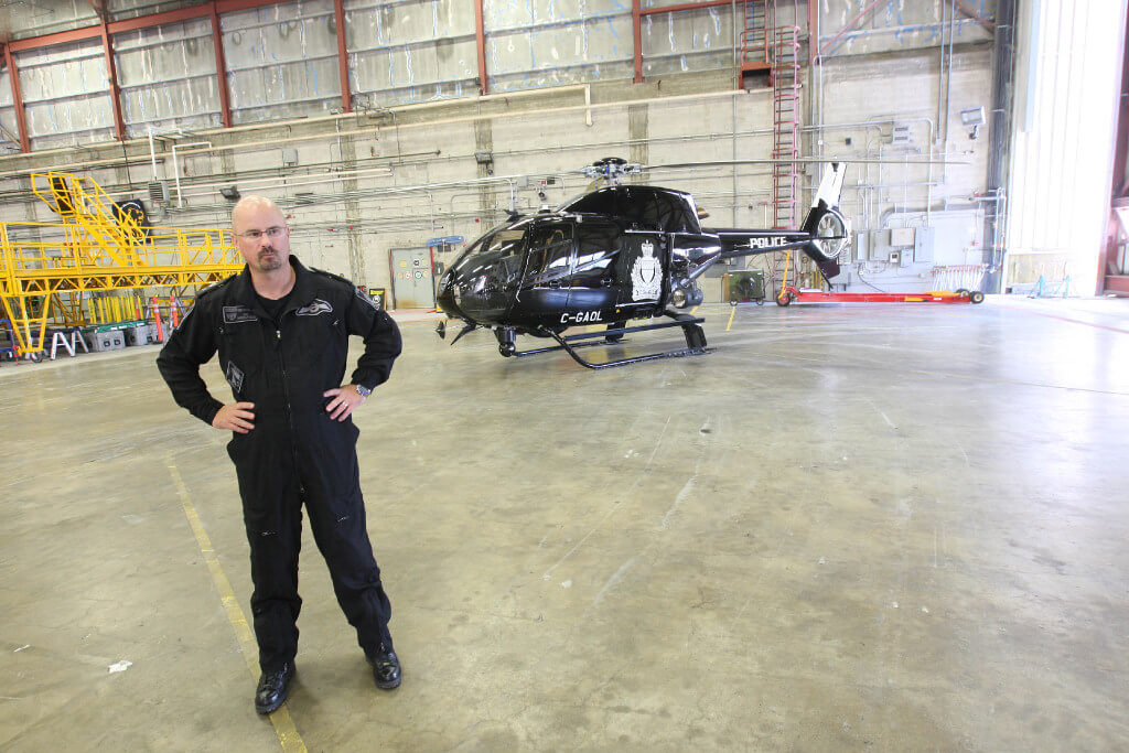 JOE BRYKSA / WINNIPEG FREE PRESS Patrol Sergeant Rob Duttchen- Unit Operations Winnipeg Police Service Air 1 helicopter from 17th Wing in Winnipeg Friday afternoon - Sept 09, 2016 -(See Story)