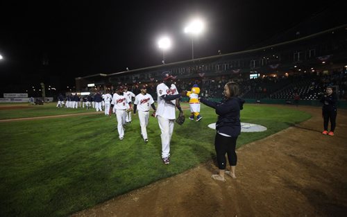 RUTH BONNEVILLE / WINNIPEG FREE PRESS

Winnipeg Goldeyes come off the field celebrating winning their 2nd game against the St. Paul Saints in the playoffs series at Shaw Park Friday night.  Score was 9 - 7 for Goldeyes.

September 9 2016
