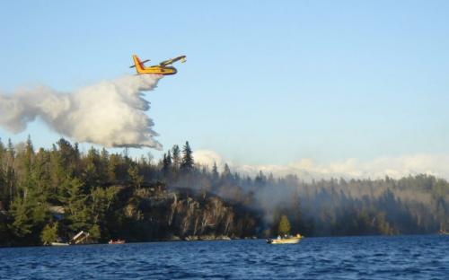 Aldo,   Here are two of the best pictures from little Indian bay on west hawk lake, no big flames the most action was the water bomber.  Nick Maguire photo winnipeg free press