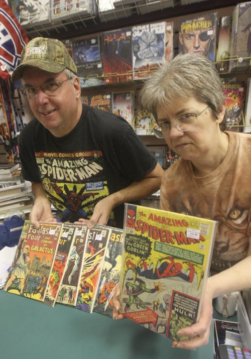 JOE BRYKSA / WINNIPEG FREE PRESSBook Fair -340 Portage Ave-Manager Daniel Wiwchar, and part owner Judy Weselowski with 14th edition Amazing Spiderman Comic valued at $2750.00 and selection of early Fantastic Four comic books worth $400-$600- Sept 14, 2016 -(See Dave Sanderson 49.8 Story)