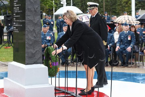 MIKE DEAL / WINNIPEG FREE PRESS

Hon Janice Filmon, Lt Gov of Manitoba, lays a wreath at the memorial in the Garden of Memories during the Battle of Britain ceremony at 17 Wing Winnipeg Sunday morning. 

160918
Sunday, September 18, 2016