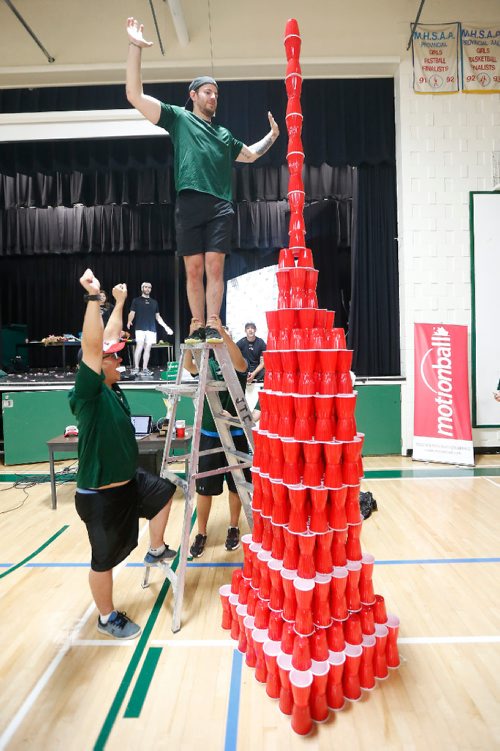 JOHN WOODS / WINNIPEG FREE PRESS
Thomas Stuart-Dant and Brett Miller of Team Alex celebrate their 32 cup high stack at the 4th annual motionball Marathon of Sport to raise money for Special Olympics at John Taylor Collegiate Sunday, Sept 18, 2016.


