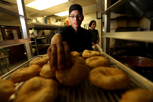 TREVOR HAGAN / WINNIPEG FREE PRESS
Feast. Braydon Kirkness with bannock. Restaurant Review. Saturday, September 17, 2016.