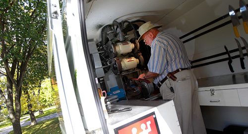 PHIL HOSSACK / WINNIPEG FREE PRESS -  Gord Hymers, at work in the workshop of his mobile sharpening service. After years of sharpening skates Gord's retired and moves his tools around town to sharpen knoves and scissors. See Dave Sanderson's story. September 19, 2016