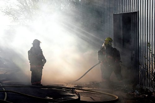 BORIS MINKEVICH / WINNIPEG FREE PRESS  080521 Fire crews fight a fire on Dufferin in a commercial warehouse.