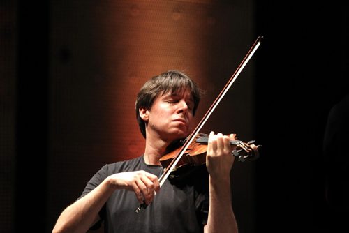 RUTH BONNEVILLE / WINNIPEG FREE PRESS

International violin super star Joshua Bell rehearses at the concert hall Tuesday morning with the WSO the music of Tchaikovsky's Violin Concerto on the 1733 Huberman Stradivarius valued at over $15 million before his  special Opening Night Gala Concert with the Winnipeg Symphony Orchestra (WSO).
September 20, 2016

