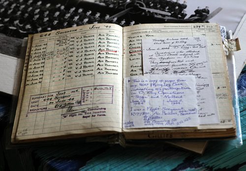 RUTH BONNEVILLE / WINNIPEG FREE PRESS

Feature story on Ninety-five-year-old veteran Emil August Gillies who served in the second world war in the air force in the 644 Squadron who recently received the Legion of Hoonour award (similar to a Knighthood) from the French Republic for his service to them during the war.  
Photo of log book of Emil Gillies on June 1944 - D Day.  
September 20, 2016
