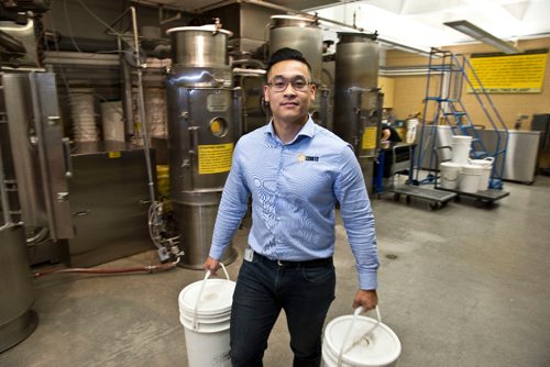 MIKE DEAL / WINNIPEG FREE PRESS
Aaron Onio, a Malting and Brewing Technical Specialist in the Pilot Malting Plant at the Canadian Malting Barley Technical Centre on the 13th floor of the Canadian Grain Commission Building, 303 Main Street.
160922 - Thursday, September 22, 2016 - 

