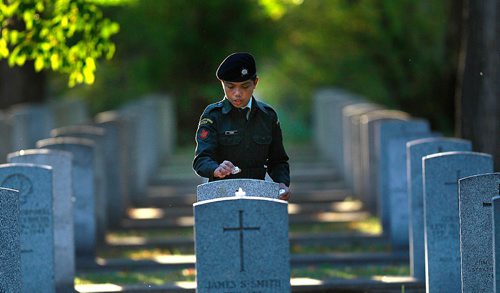 PHIL HOSSACK / WINNIPEG FREE PRESS -  Cadet Ezra Casimo carefully places an LED candle on top of one of over 11,000 military graves at Brookside Centery Thursday evening preparing for the anniual Candlelight Service of Rememberance. See Release below. September 22, 2016

Public invited to Candlelight Service of Remembrance



Event to recognize, honour those who have served



Winnipeg, MB  Members of the public are invited to attend a Candlelight Service of Remembrance today, Thursday, September 22 at 8 p.m. at the Field of Honour in Brookside Cemetery, 3001 Notre Dame Avenue to recognize and honour those who have served.



A candle will be placed on each of the more than 11,000 military monuments found in Brookside Cemetery, one of the oldest and largest military interment sites in Canada.



Thousands of Canadian men and women have served and given their lives during war to help bring about peace, and they deserve our remembrance and thanks, said Jon Reyes, Member of the Manitoba Legislative Assembly for St. Norbert and Special Envoy for Military Affairs in Manitoba. We continue to honour and commemorate their service, as well as the sacrifices made by the families they left behind.



This service is about giving thanks, and honouring a past that has shaped us as a city, a province, and a nation, said Mayor Brian Bowman. It is also a chance to remember and recognize the tremendous sacrifices made to make our country and our city safe.



In addition to all three levels of government, Lieutenant Governor Janice Filmon and military representatives will take part in the service.



For more information, visit: Candlelight Service of Remembrance
