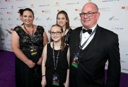 TREVOR HAGAN / WINNIPEG FREE PRESS
Piper Coffin with her parents, Cynthia and Hank, and sister Callysta, on the red carpet at the David Foster Foundation Gala, Saturday, September 24, 2016. Piper underwent a liver transplant.