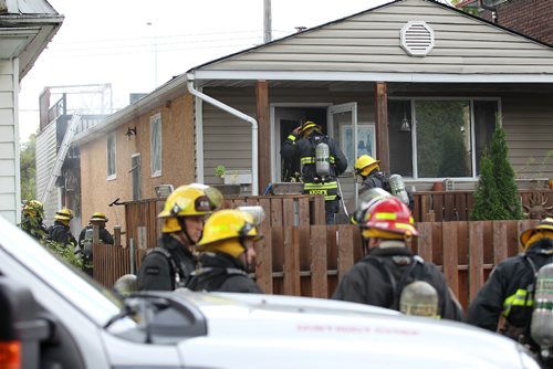 RUTH BONNEVILLE / WINNIPEG FREE PRESS

Fire crews put our a house fire at 152 McPhail St in East Kildonan Tuesday.  

September 27, 2016

