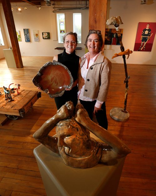WAYNE GLOWACKI / WINNIPEG FREE PRESS


The artists in ARTlington at 618 Arlington St. will be participating in Culture Days this year for the first time. Artists Crystal Nykoluk,left, holds a bowl of hers titled Maitake Nesting and Sandra Vincent by her clay piece  titled Joyful Rebellion in the foreground that are exhibited in the group show in gallery in their building.     Erin Lebar story Sept. 27 2016